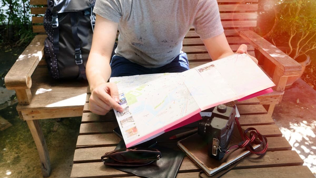 Person Holding White Book