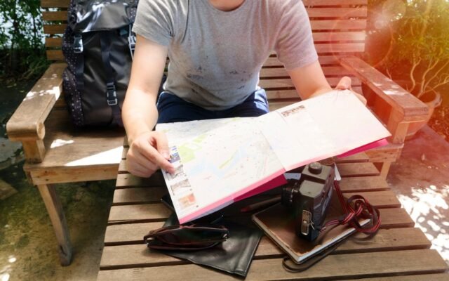 Person Holding White Book